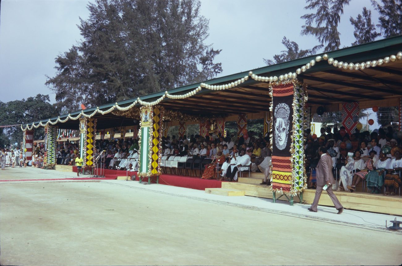 FESTAC ’77 Durbar pavilion with Queen Idia banners and packed crowd