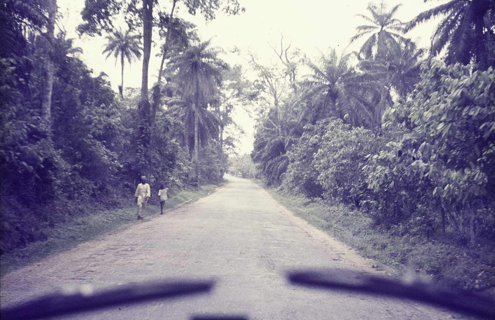 Nigeria road from a car windshield, early 1970s