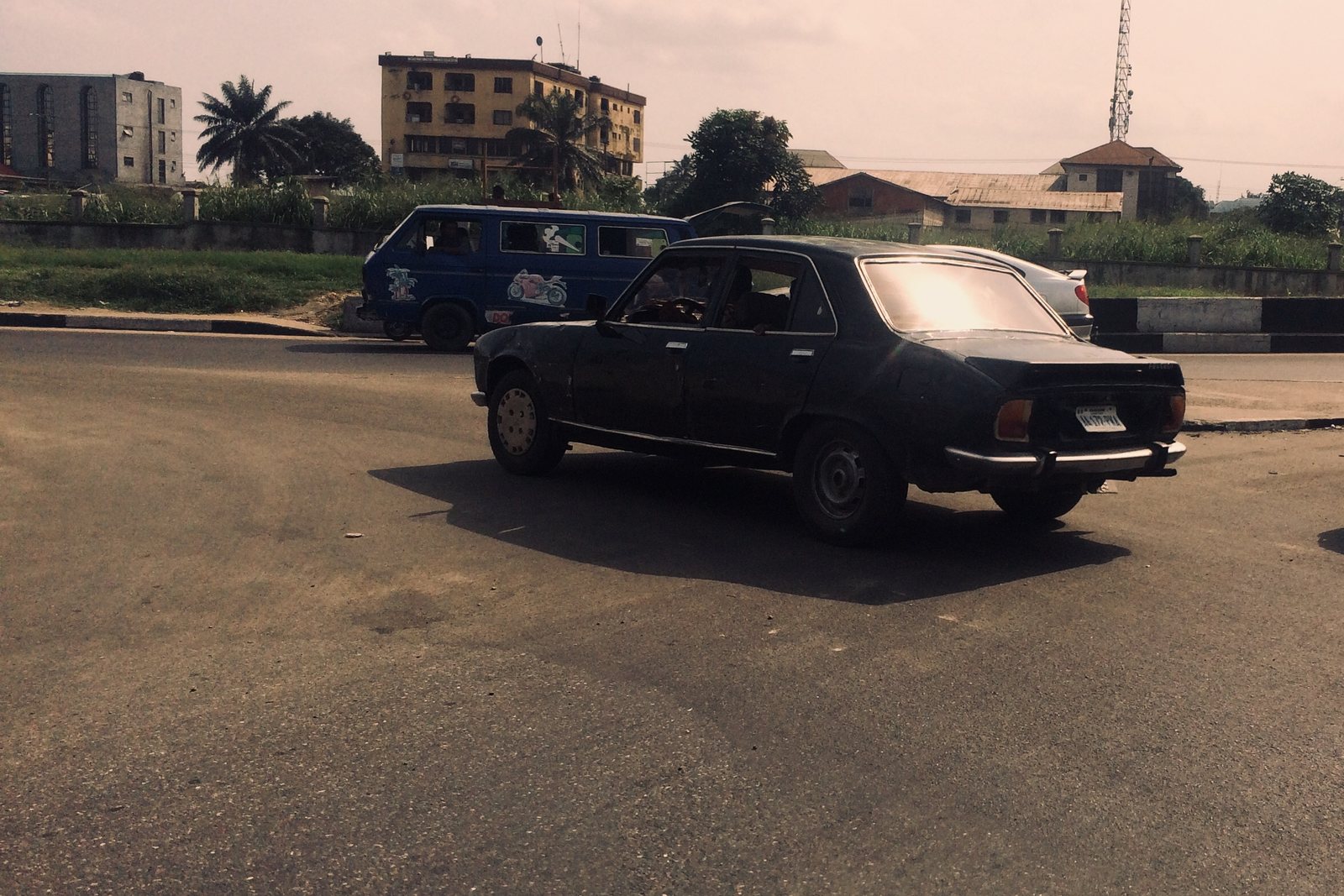 Vintage Peugeot 504 on a Port Harcourt street