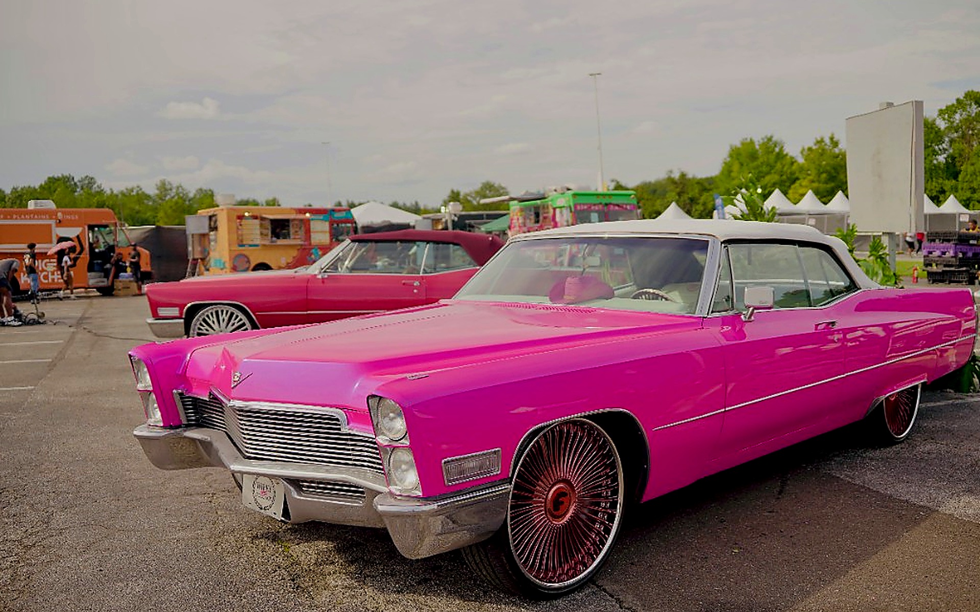 Show Body at Festac Square — pink Cadillac on the AFRO+ Fest activation lot